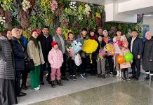 Спортчуларды кантип тосуп алышты, – сүрөт