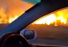 На объездной трассе сильный пожар. Горит поле и лес