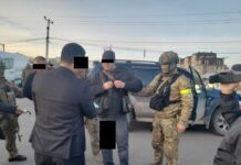 За вымогательство $6 тысяч задержаны два сотрудника МВД. ФОТО