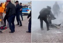 Вкладчица финансовой пирамиды подожгла себя у здания МВД. ВИДЕО