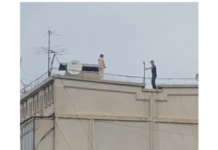 В Бишкеке милиционер не дал девушке спрыгнуть с крыши многоэтажки