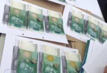 Сокулук районунун архитектура кызматкери сексен миң сом пара алып жатканда кылтакка илинди