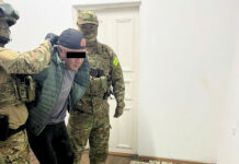 ГКНБ задержал члена ОПГ Кольбаева при попытке сбыта фальшивых долларов