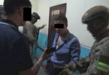 Ноокат райондук милициясынын тергөөчүсү пара менен кармалды — видео