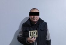 В Токмаке мужчина подозревается в избиении сына с инвалидностью и жены