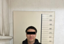 Биринчи май РИИБдин тергөөчүсү 10 миң доллар алып жаткан жеринен кармалды