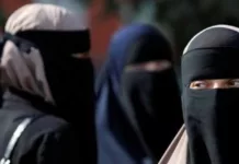 УКМК эскертет: Коомдук жайларда «никаб» кийгендер 20 миң сом айыпка жыгылат