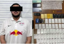 «Жанынан 700 SIM-карта табылган». Бишкекте кибершылуундукка шектелген жигит кармалды