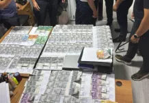 В Бишкеке в кабинете полковника милиции нашли почти 6 млн сомов и $46 тысяч